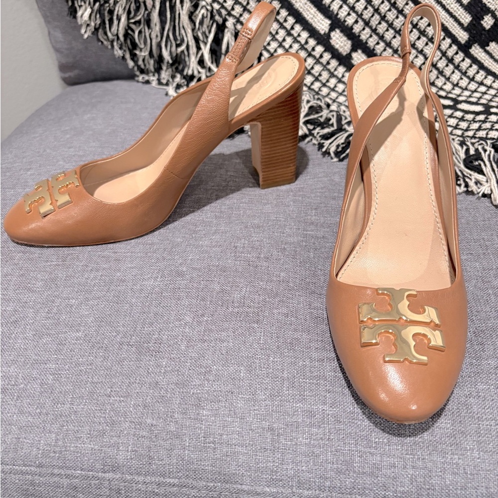 Tory Burch heels.  Never worn.  Size 7.5 women.  Beige/camel color.